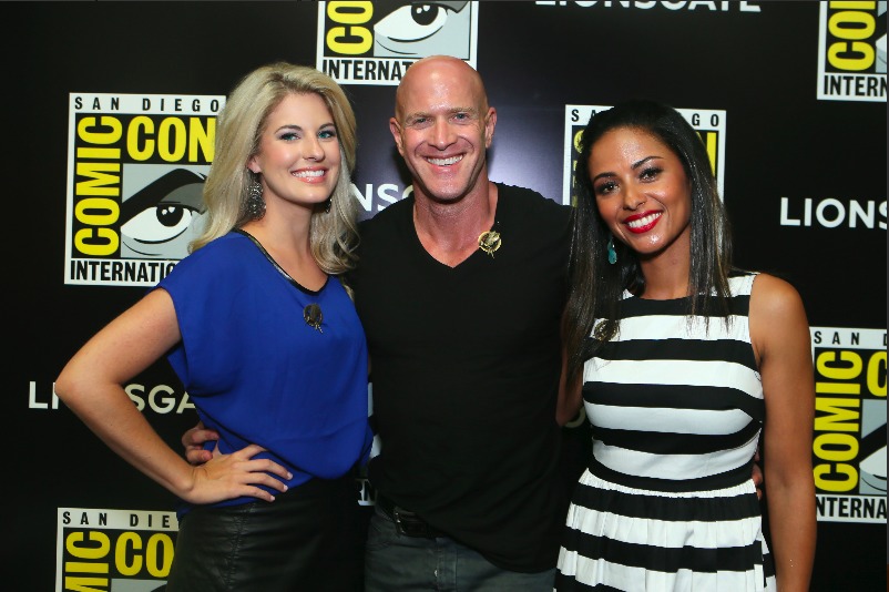 Stephanie Leigh Schlund, Bruno Gunn & Meta Golding attend the 'Hunger Games: Catching Fire' press line at Comic-Con International 2013 on July 18, 2013 in San Diego, California.