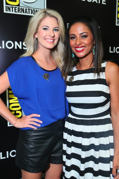 Stephanie Leigh Schlund & Meta Golding attend the 'Hunger Games: Catching Fire' press line at Comic-Con International 2013 on July 18, 2013 in San Diego, California.