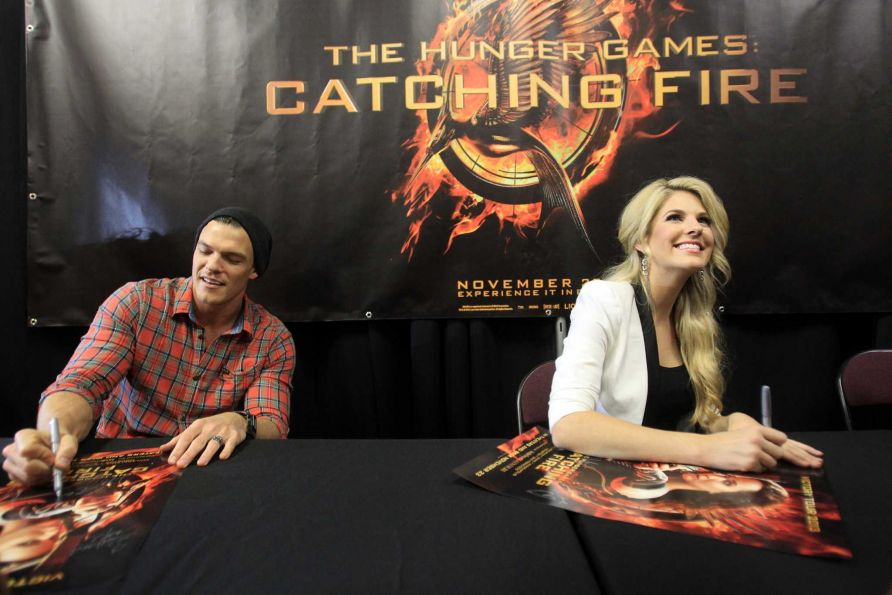 Stephanie Leigh Schlund and Alan Ritchson during 'The Hunger Games: Catching Fire' National Victory Tour on November 6, 2013 in Houston, Texas