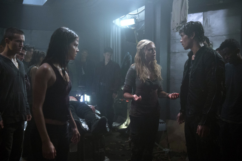 Still of Eliza Taylor, Bob Morley and Marie Avgeropoulos in The 100 (2014)