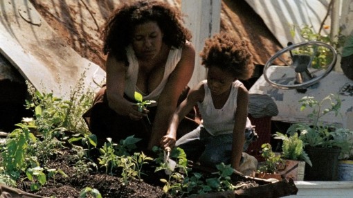 Scene from Benh Zeitlin's Beasts of the Southern Wild. Quevenzhane Wallis as Hushpuppy and Gina Montana as Miss Bathsheeba, the school teacher.