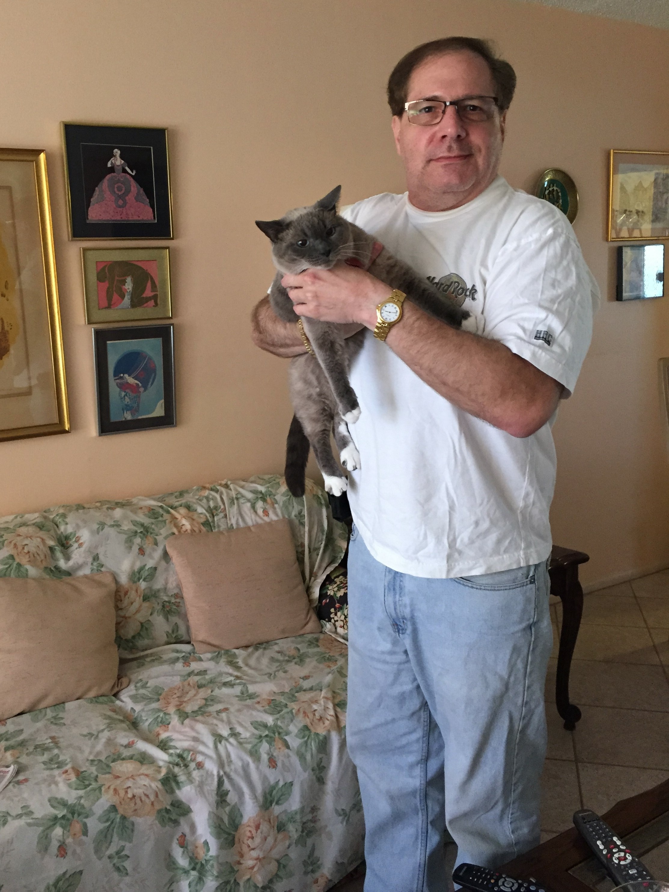 Barry holds mom's kitty cat, Miss Kitty.