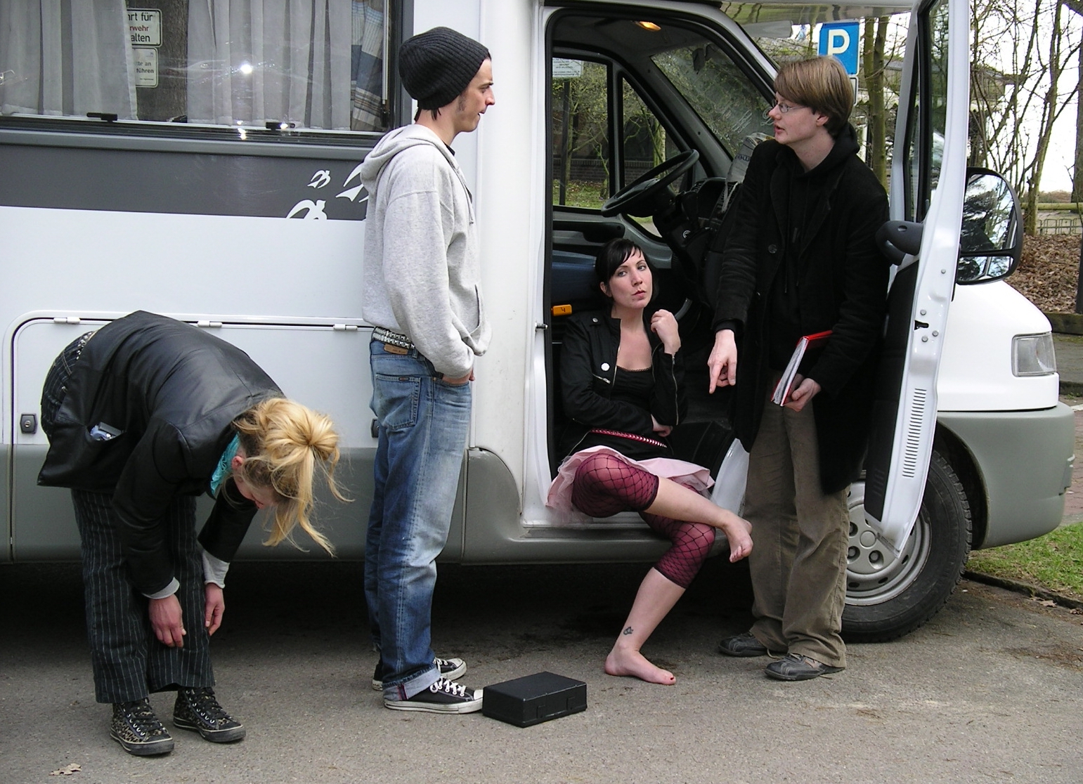 Andreas Cyrenius on the set of his 2006 feature length film Bangbus giving instructions to actors Niels Donner, Vivian Bullert and Sybille Weiser.