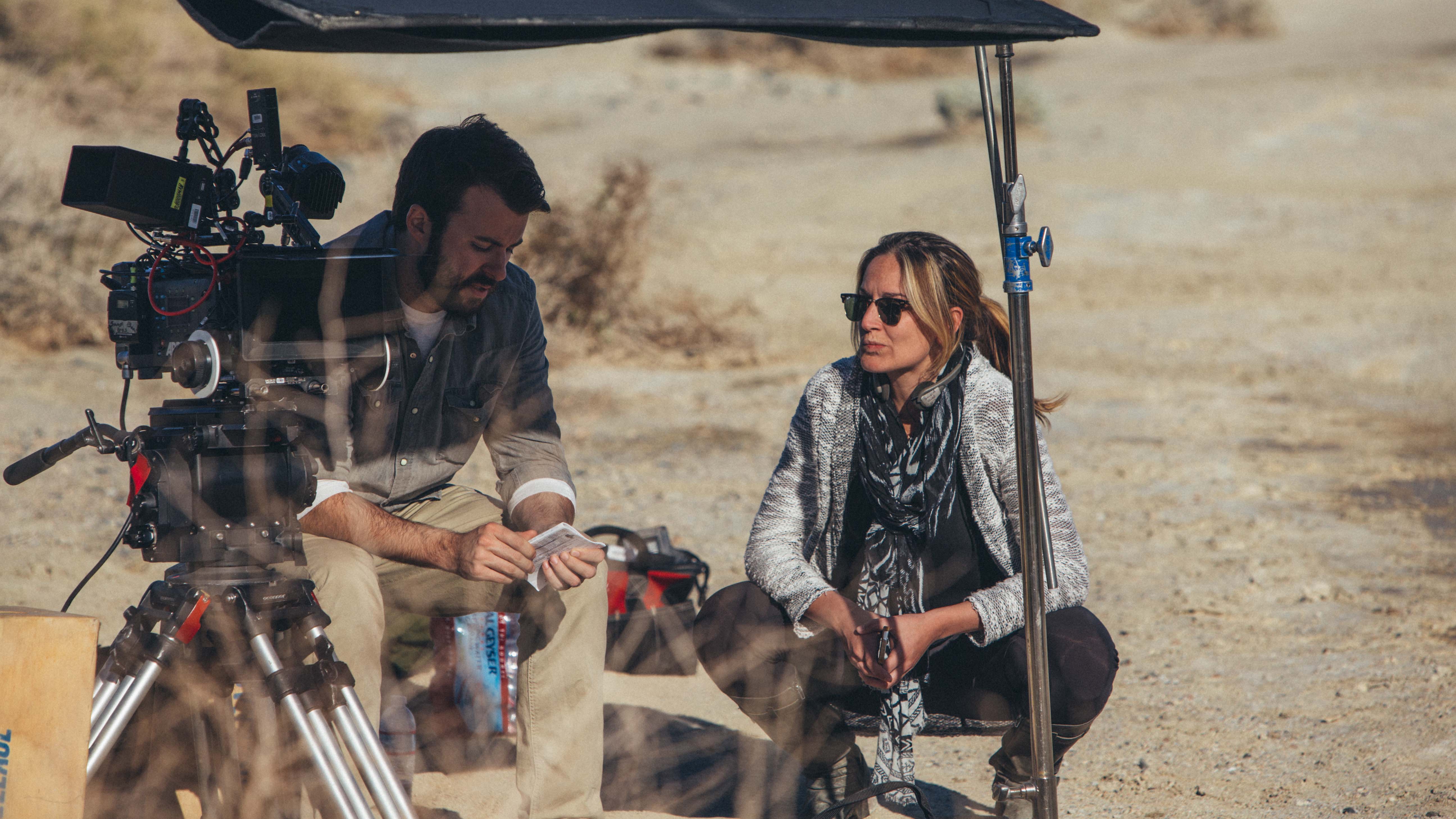 Director Ashley Avis working with cinematographer Garrett O'Brien on the set of Deserted