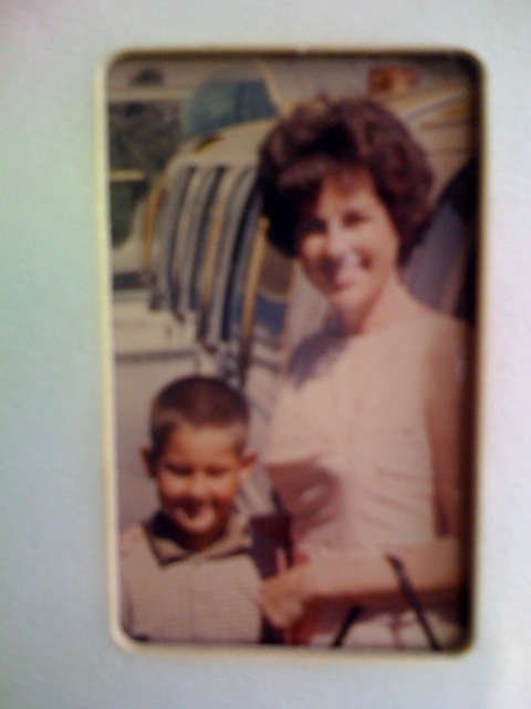 As a little boy with mother at Disneyland