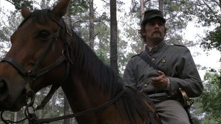 Julian Adams as 'Captain Robert Adams,' atop Count of War, in 