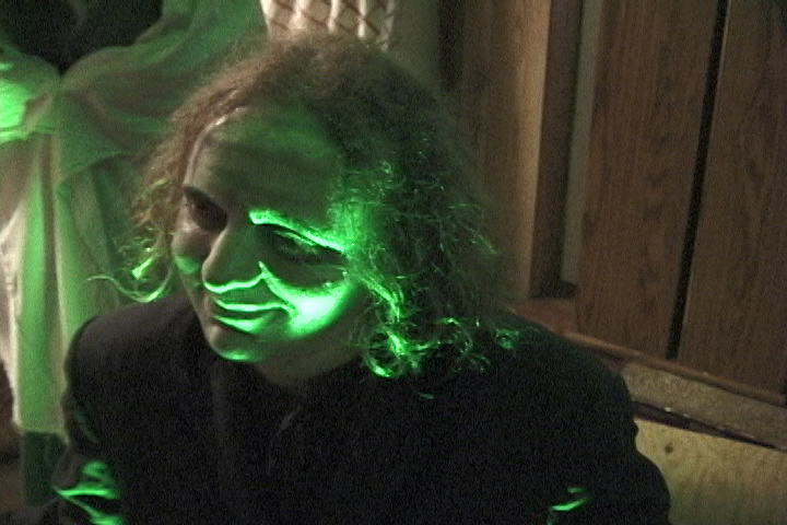 Jeff Kirkendall as the sinister Father Merrow, an apparition who may or may not be real, in the feature film 