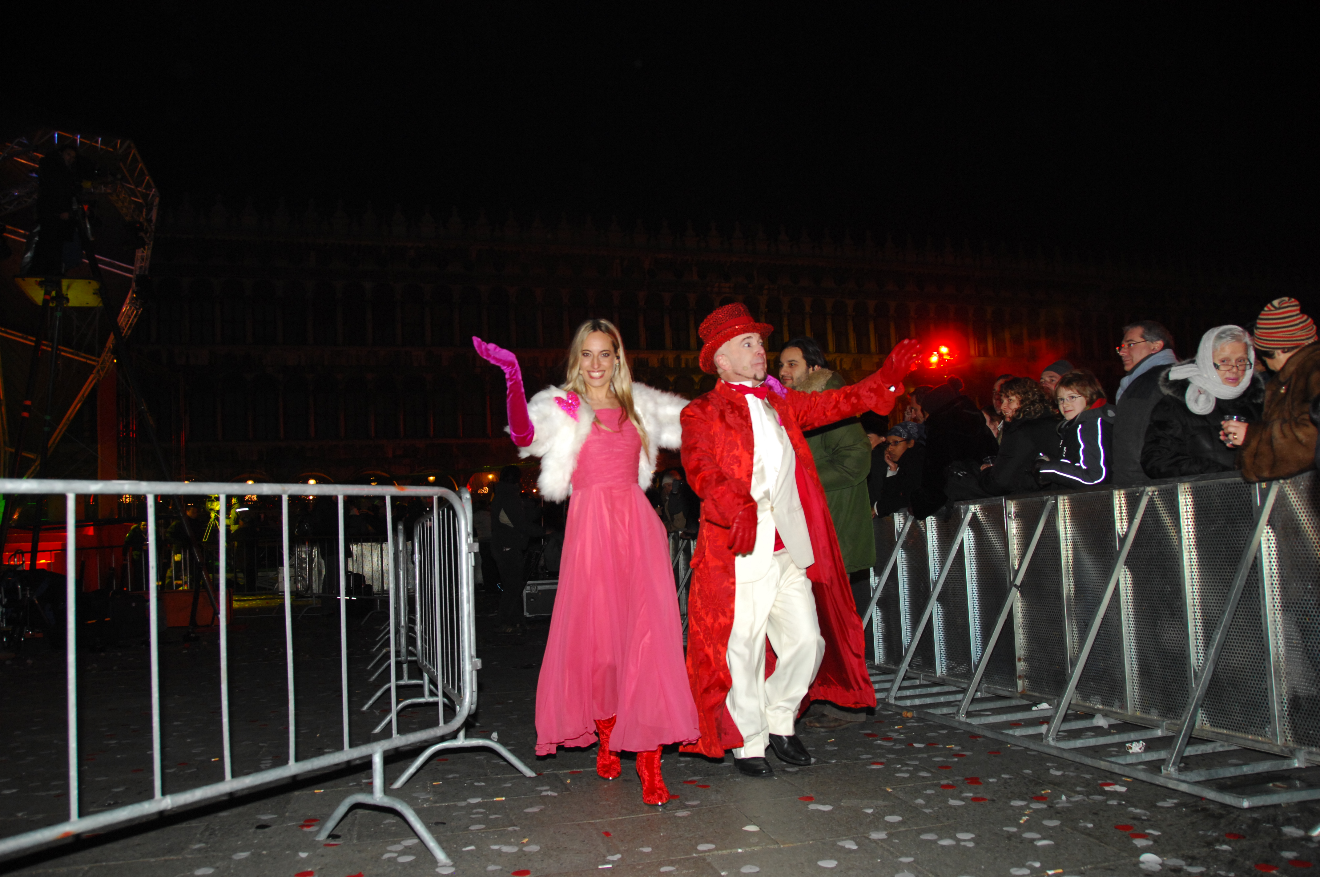 Jessica Polsky leaves the stage with co-host, Doug Jack, after hosting the internationally broadcast New Year's Eve event in Venice's Saint Mark's Plaza, to a live crowd of over 90,000.