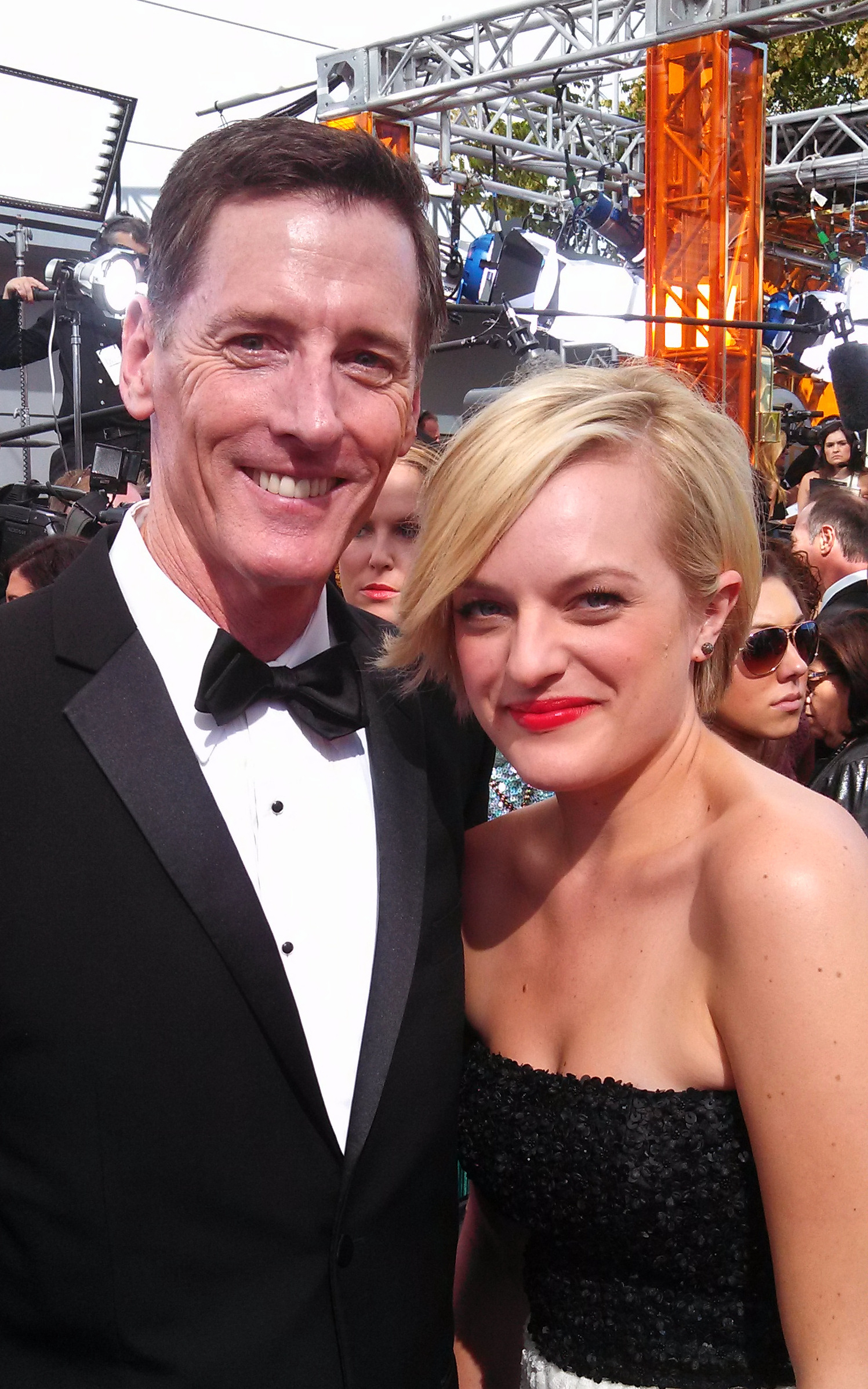 Kenneth Kemp and Elizabeth Moss at 2013 Emmys