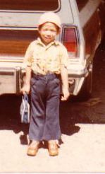 Edmund K Lo At Age 5 Years Old in front of his old house next to his dad's car in Downey California USA.