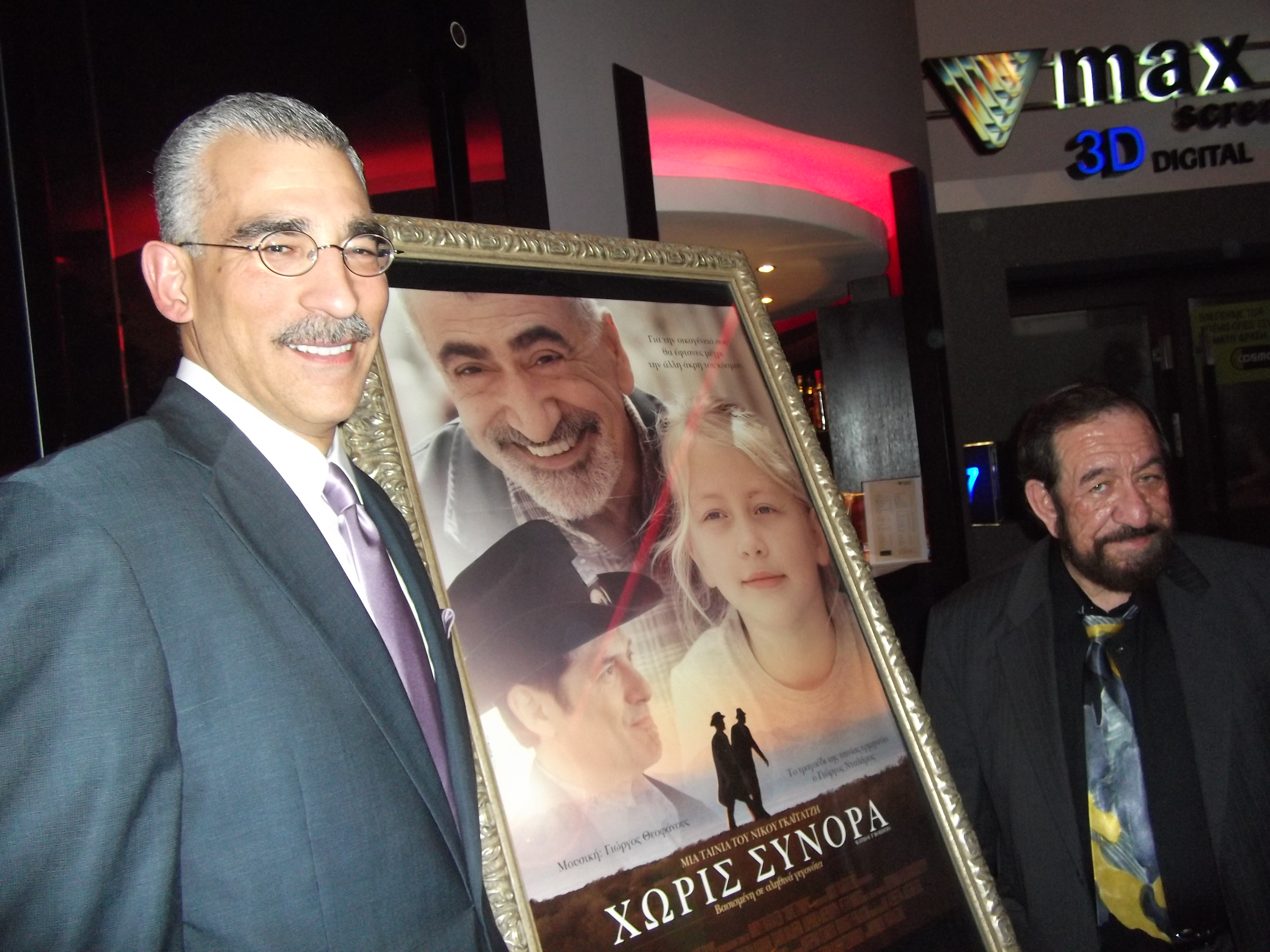 Jesse & Actor Paul Lillios next to movie poster at 