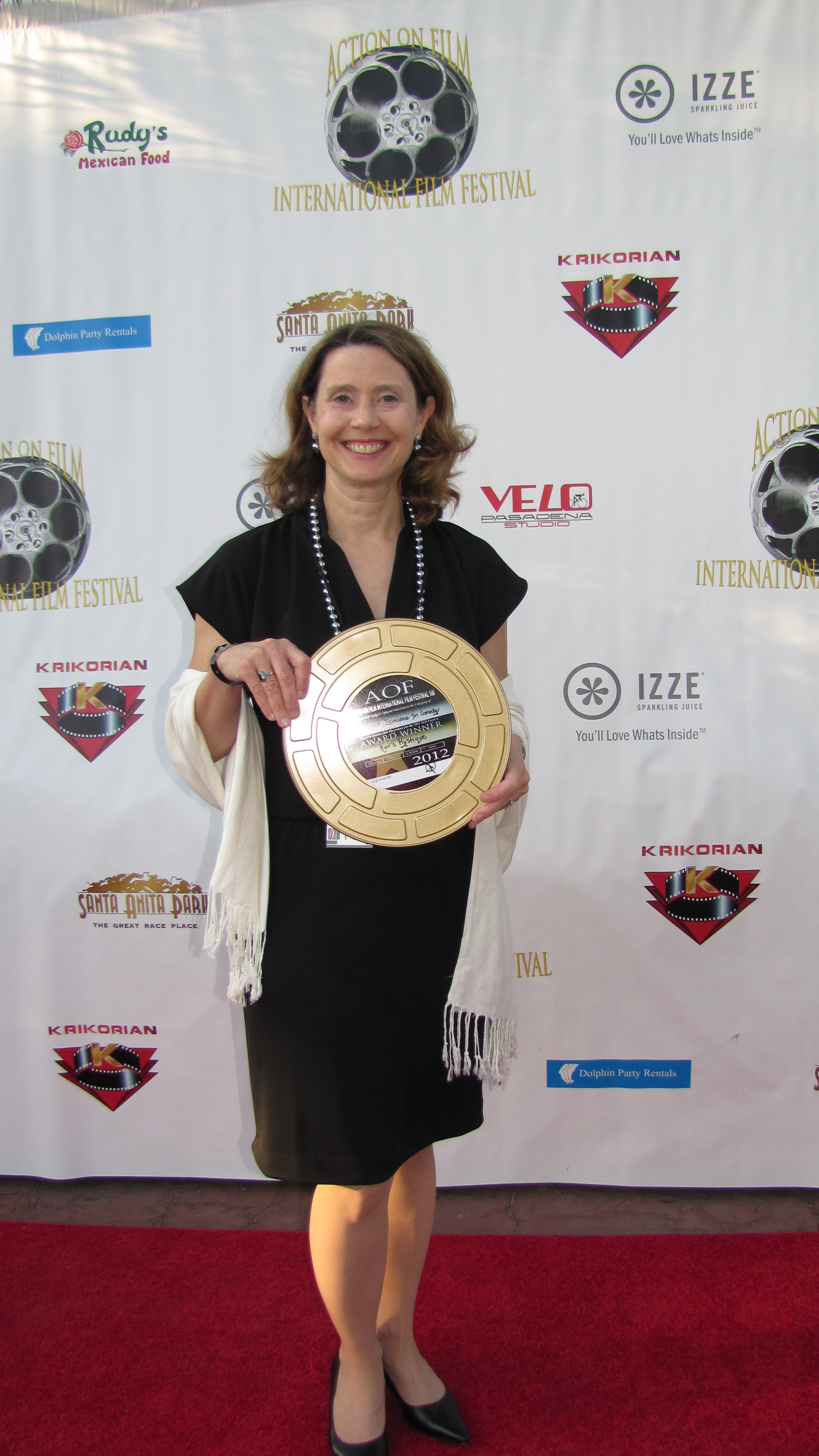 Colleen on the red carpet at the AOF Black Tie event at Santa Anita racetrack. Colleen won the 