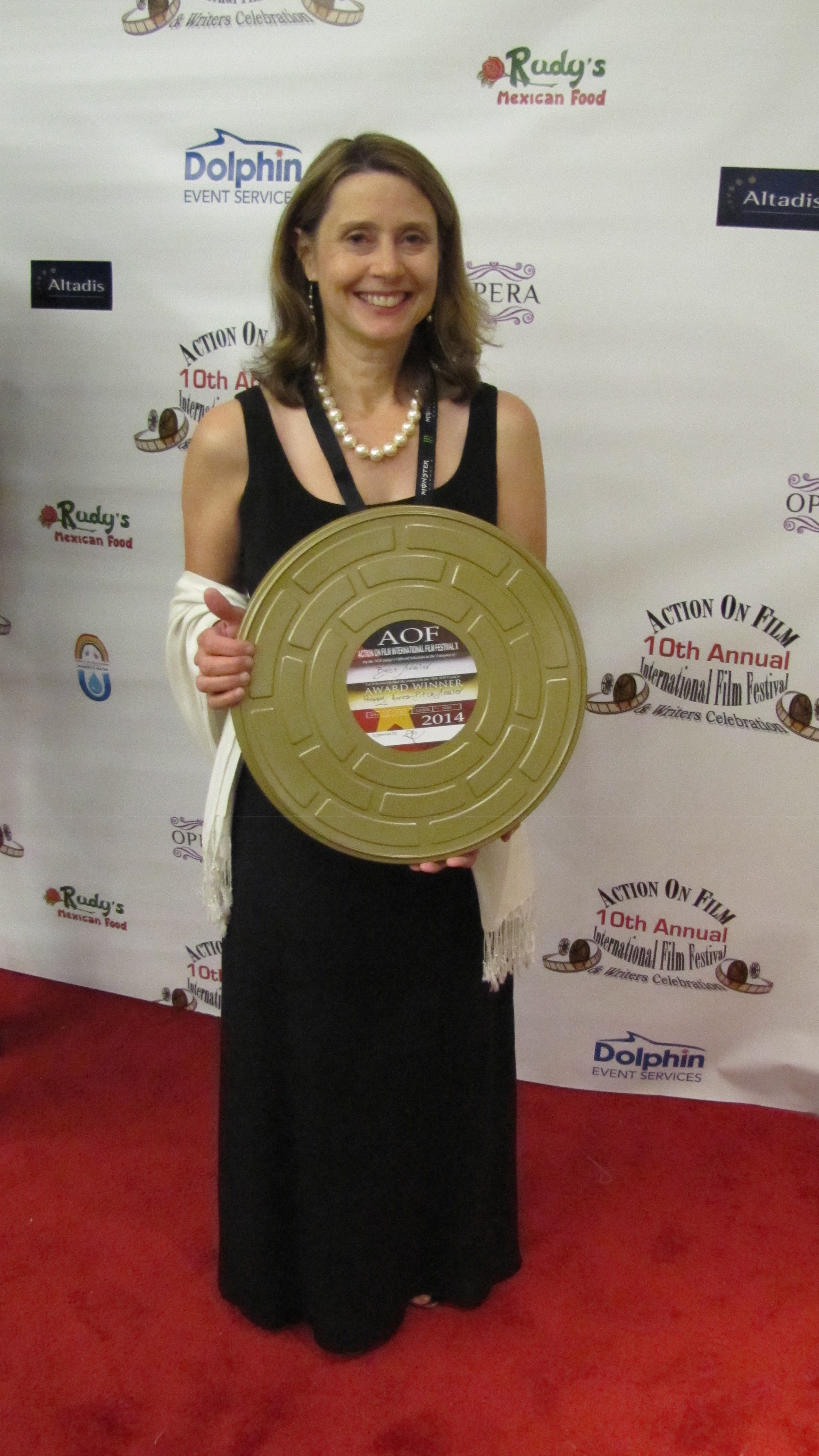 Colleen with her award for 