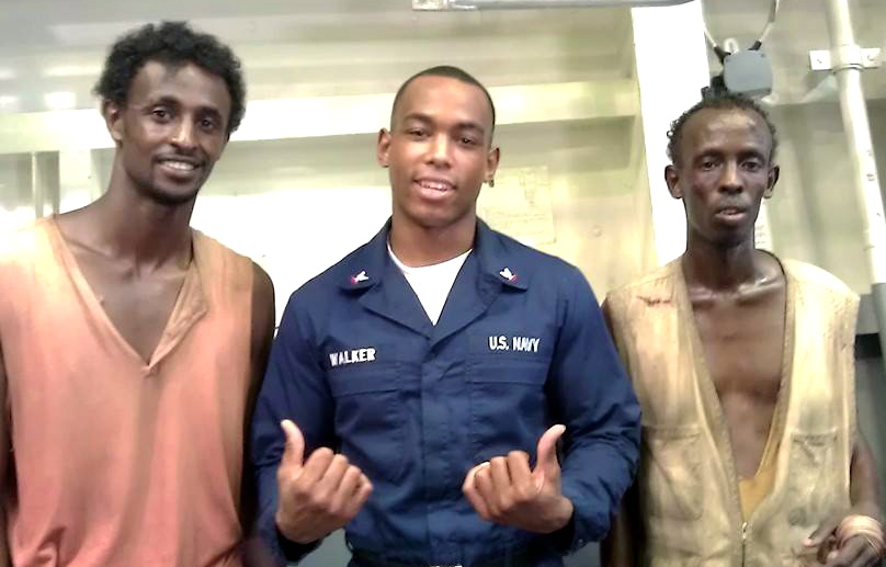 Barkhad Abdirahman, Roger Edwards & Barkhad Abdi on set of Captain Phillips.