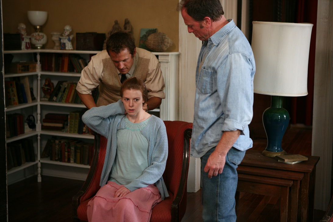 Still of Ashley Bell and Patrick Fabian in The Last Exorcism (2010)