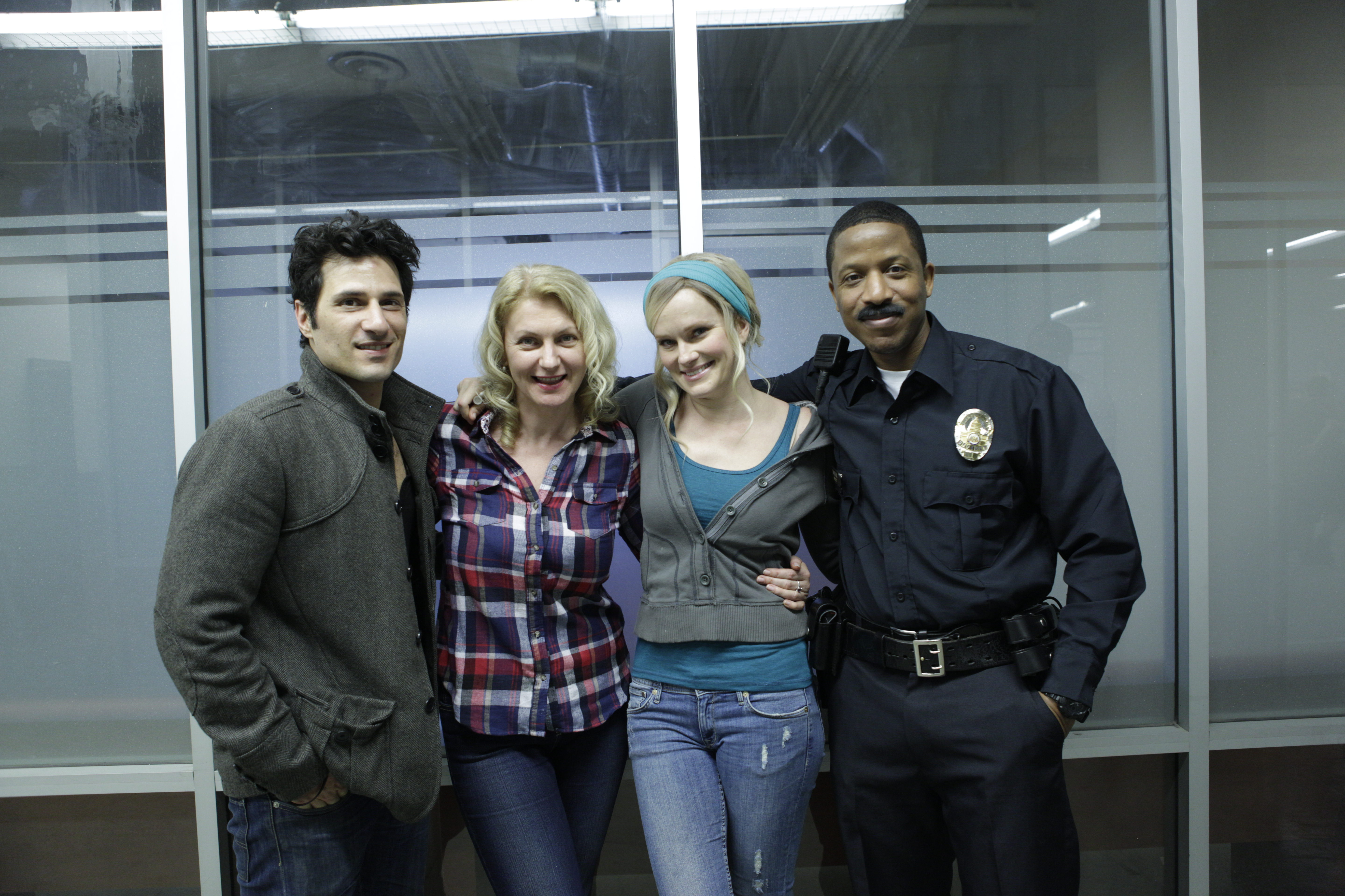 Producer Tatiana chekhova posing with Actors Hal Ozsan, Nicholle Tom and Ray Stoney on the set of Private Number