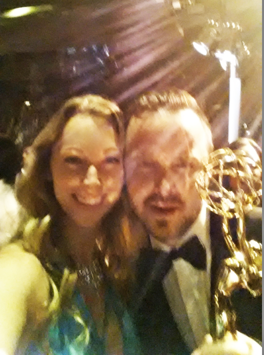 Emmy winning star Aaron Paul with Jennifer Day at the Emmys