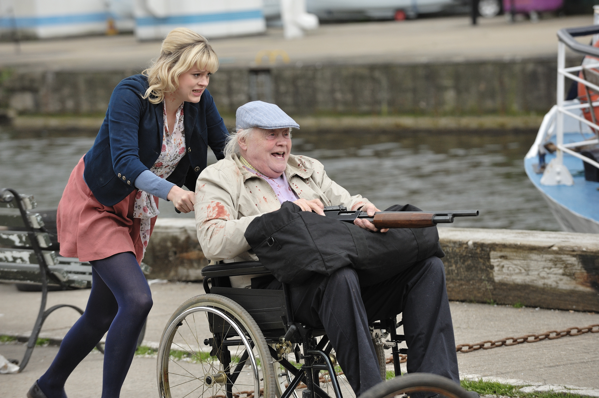 Still of Dudley Sutton and Georgia King in Cockneys vs Zombies (2012)
