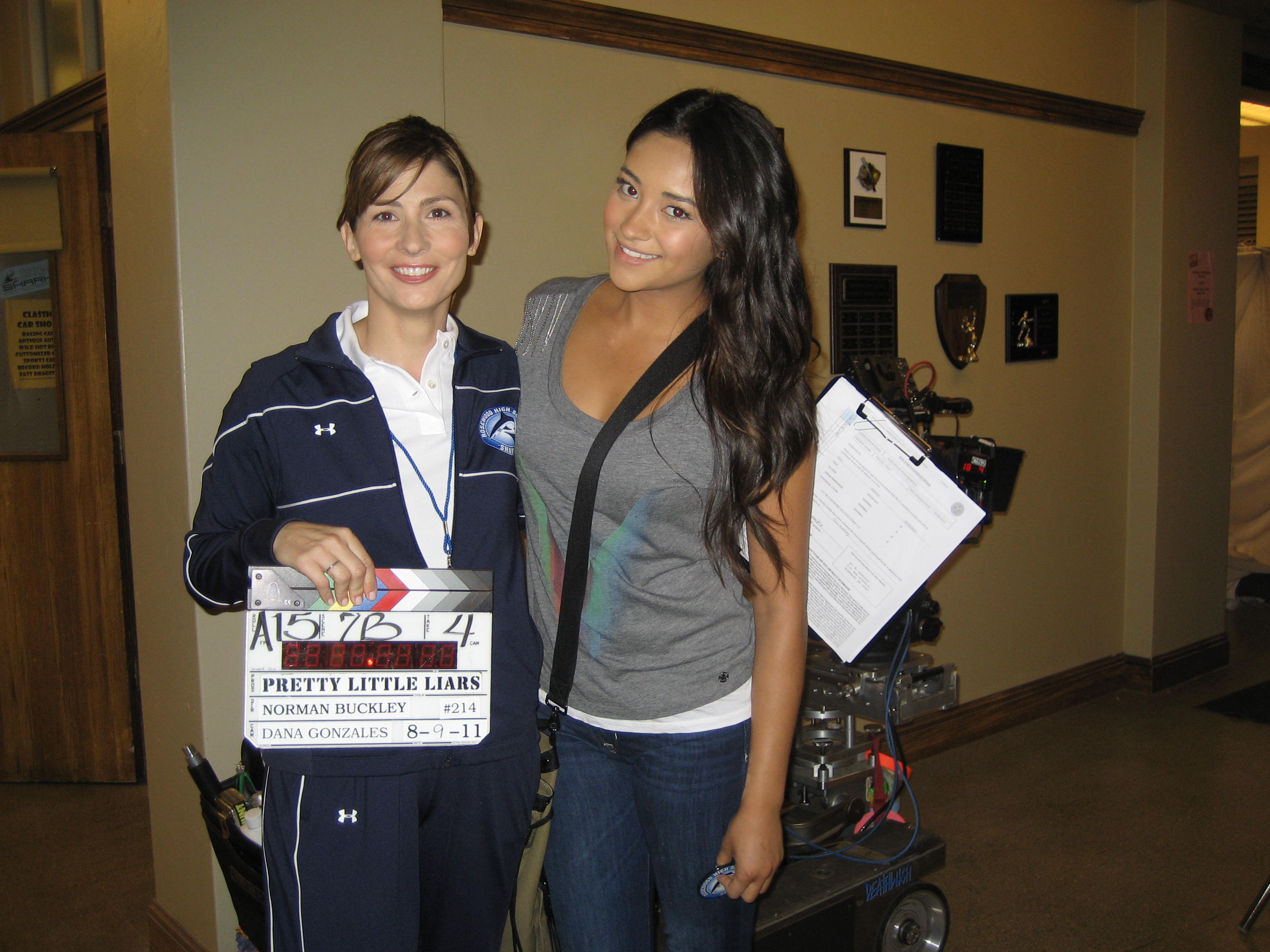 Henree Alyse as Coach Solcomb with Emily(Shay Mitchell)