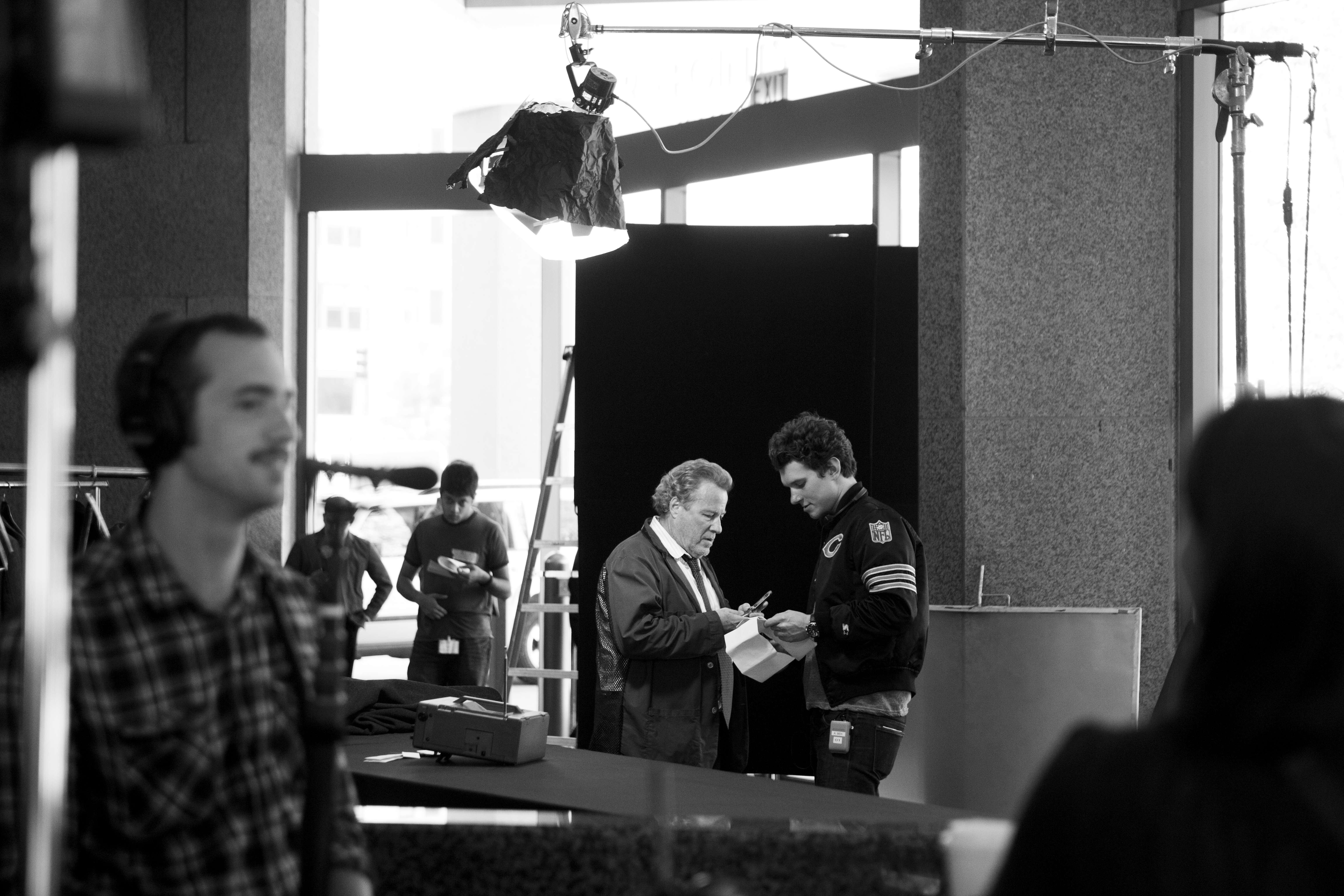 Behind the scenes on the set of WARREN. Director Alex Beh speaks with Actor John Heard.