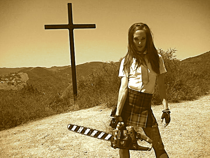 Stephanie Edmonds in Behind the Scenes of Catholic Schoolgirl Chainsaw Showdown (2012)