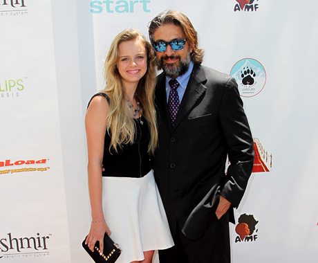 Brighid Fleming and Red Carpet LAs Roger Zamudio celebrate the 15th Annual Teen Choice Awards at the Celebrity Gift Lounge.