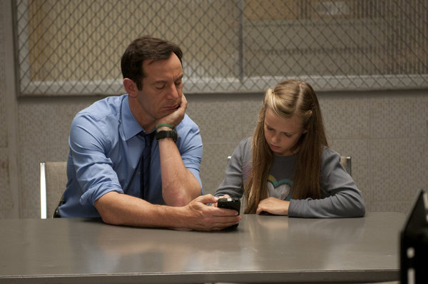 Still of Jason Isaacs and Brighid Fleming in Awake (2012)