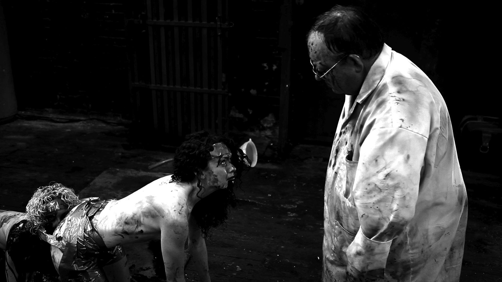 Still of Ashlynn Yennie and Laurence R. Harvey in The Human Centipede II (Full Sequence) (2011)