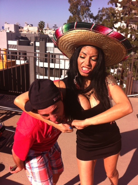 WWE Diva, Shelly Martinez puts Rocco in a Choke Hold.