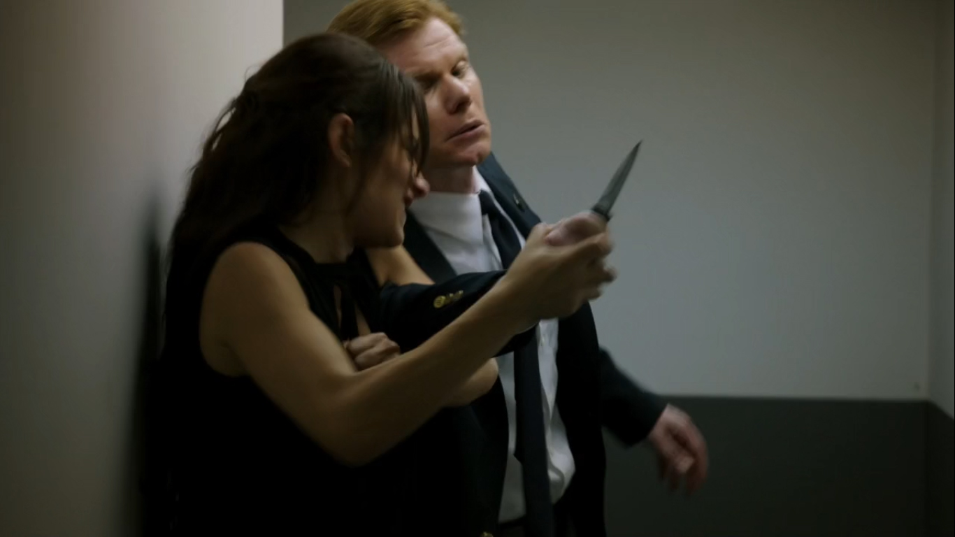 Sarah Shahi as Sameen Shaw and Bernard Bygott as Tate in Person of Interest, CBS.