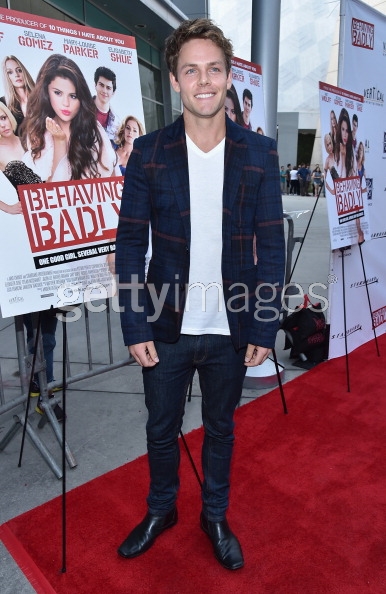 Lachlan Buchanan arrives at the premiere of Behaving Badly in Los Angeles