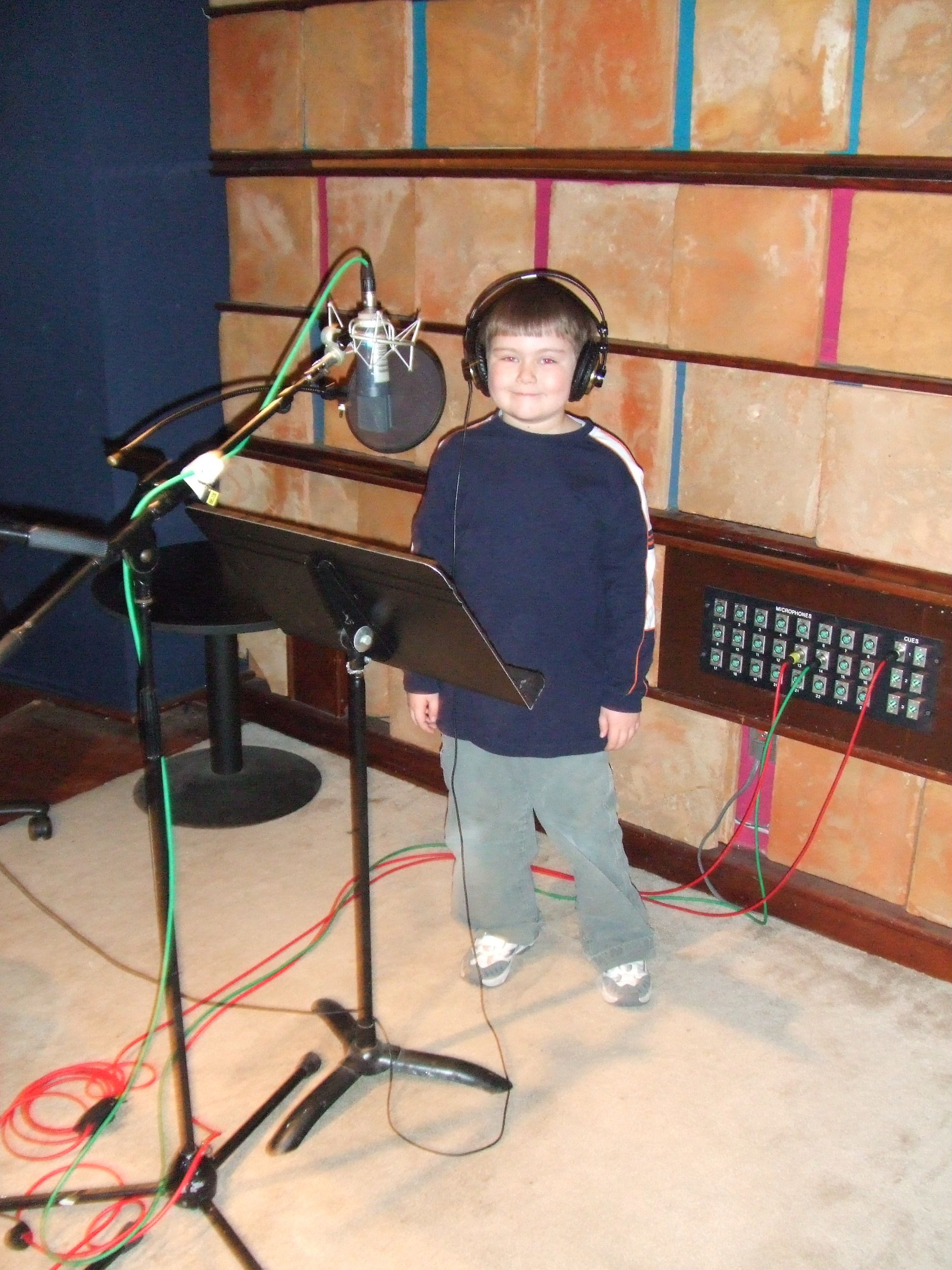 Conor Carrol in sound studio, doing voice-over work