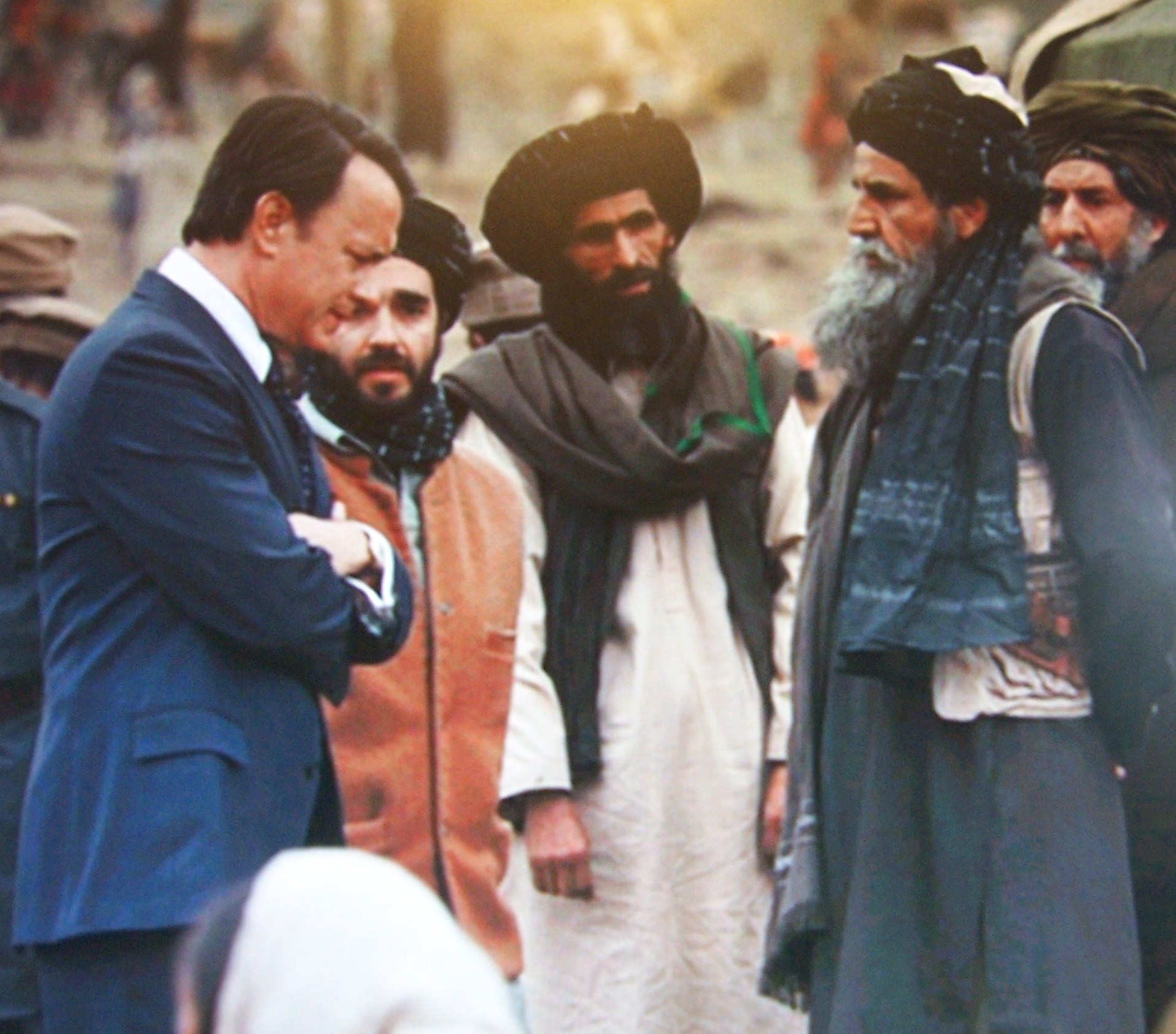 Tom Hanks, Dastan Khalili, Unknown and Enayat Delawary as Muj. Elder in Charlie Wilson's War movie