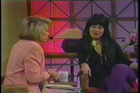 Bustamante speaking with Joan Rivers