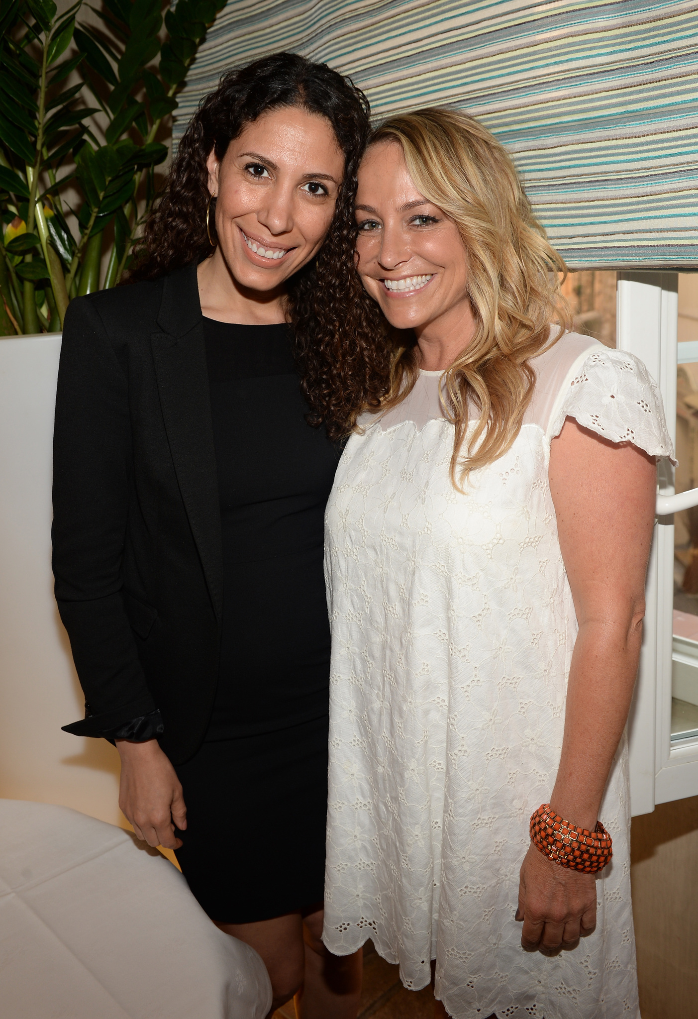 IMDb's Yasmine Hanani and Emily Glassman attend the IMDB's 2013 Cannes Film Festival Dinner Party during the 66th Annual Cannes Film Festival at Restaurant Mantel on May 20, 2013 in Cannes, France.