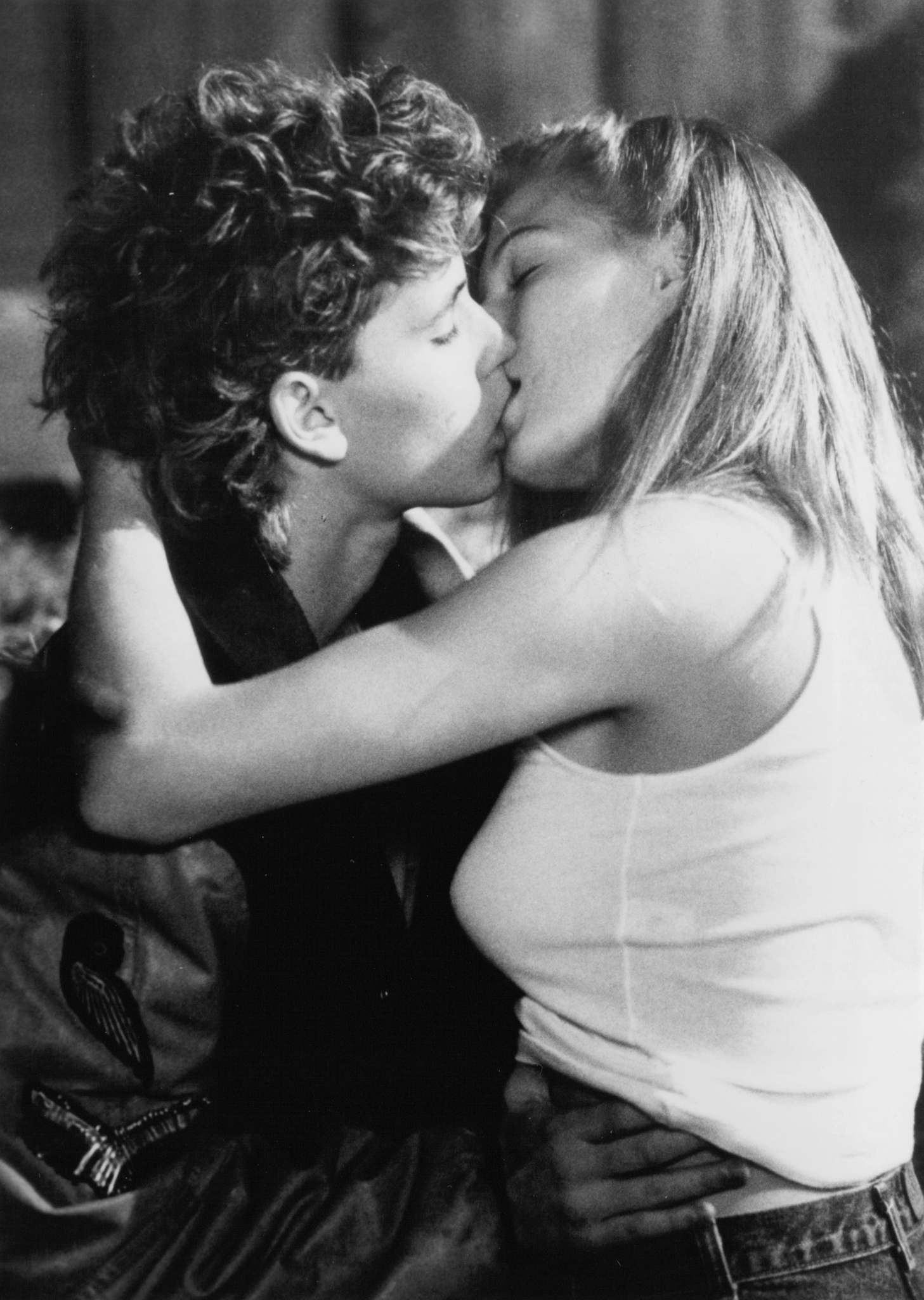 Still of Corey Haim and Lala Sloatman in Watchers (1988)