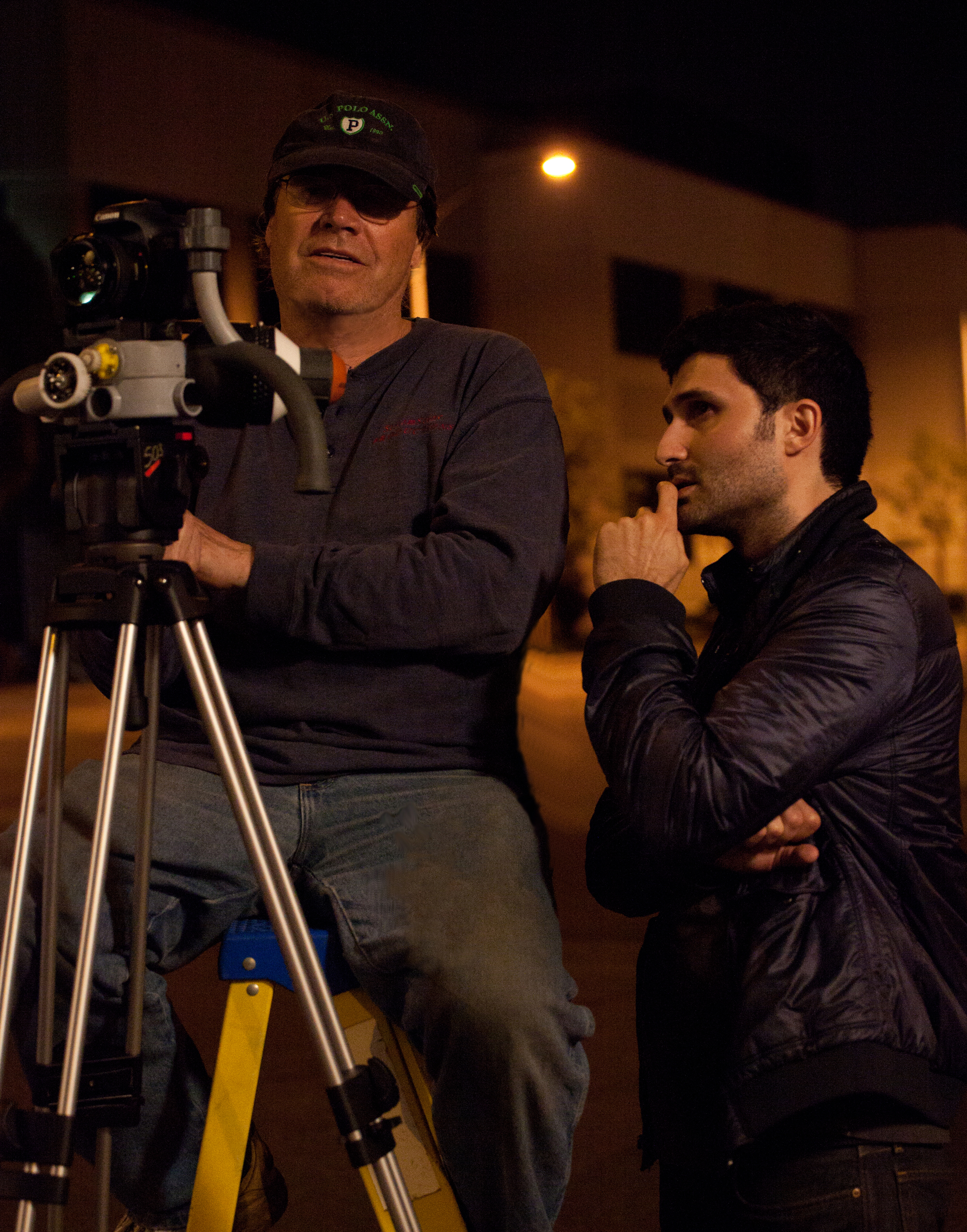 James Jay Ellis, Director of Photography for HYE POWER, discussing a shot with Nazo Bravo. 2011