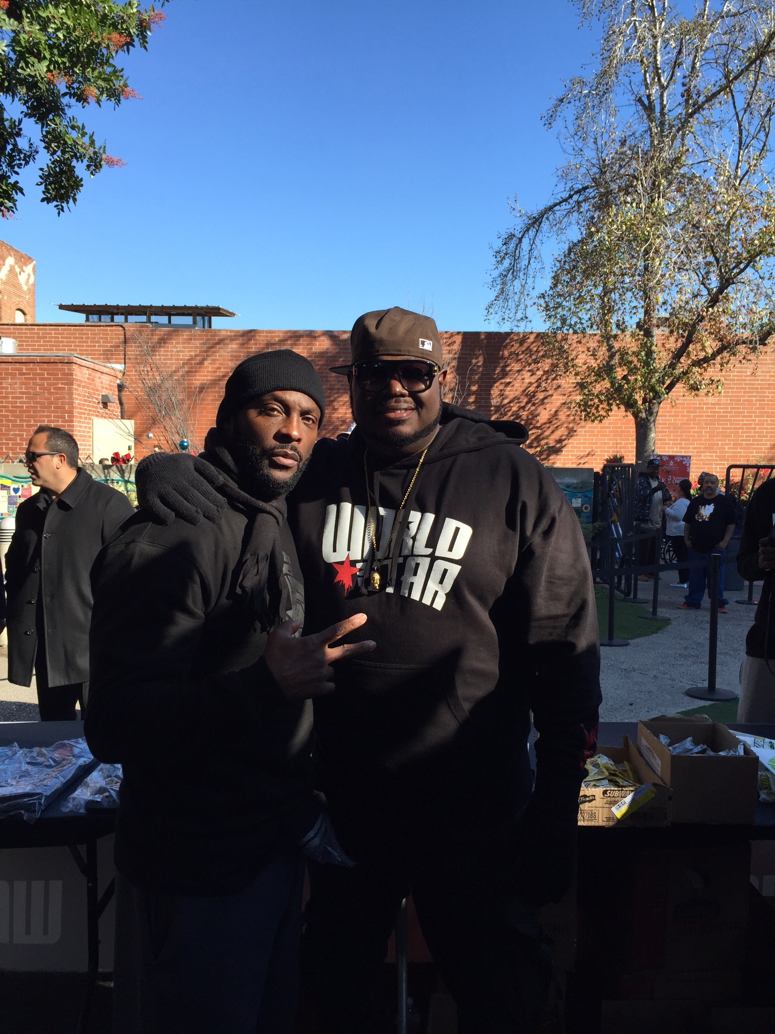 Ro Brooks and Q (owner of WSHH)@ the World Star SkidRow Christmas Giveaway