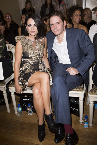 Sarah Greene and Daniel Bruhl attend the Marchesa show during London Fashion Week Spring Summer 2015 at on September 13, 2014 in London, England.