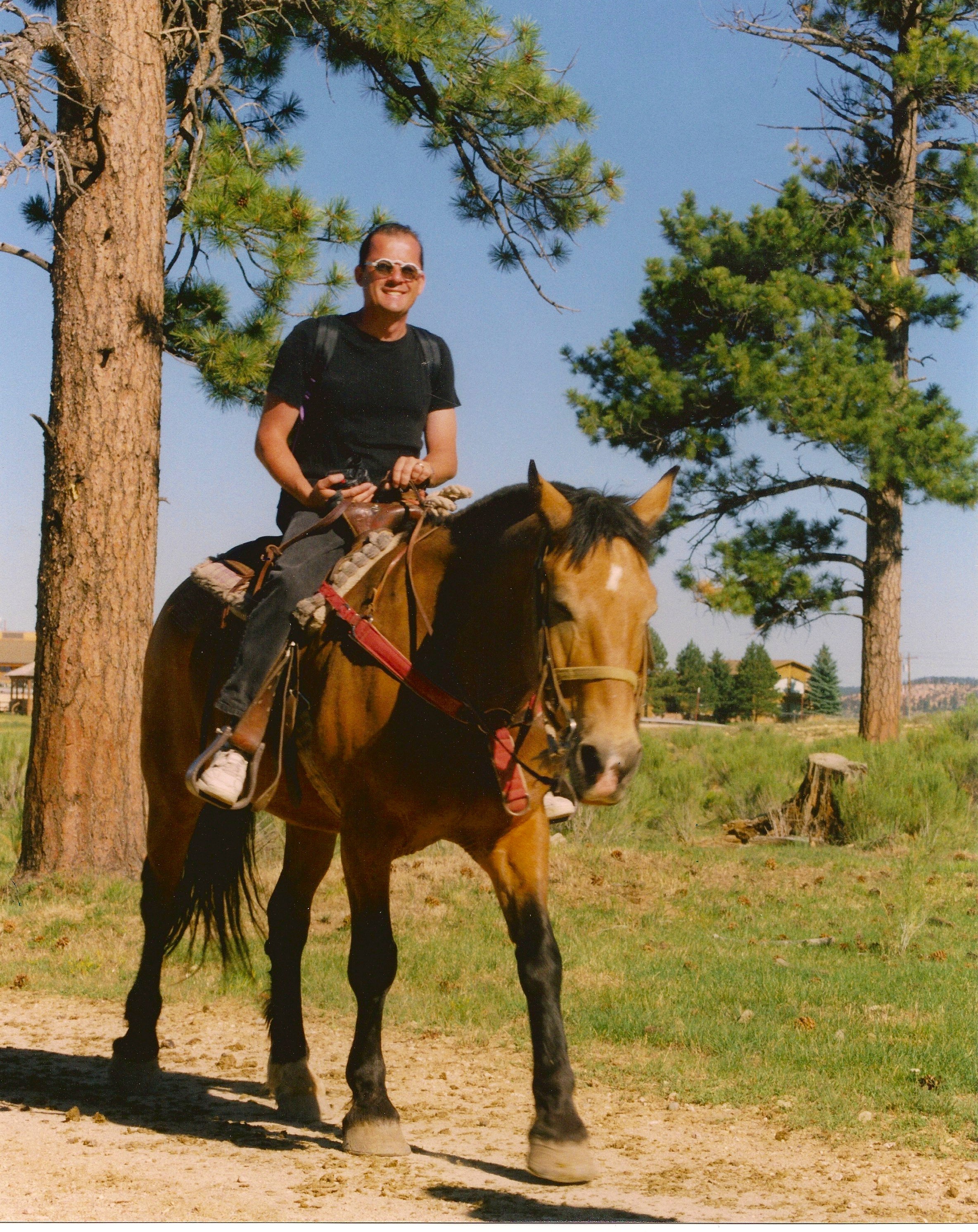 dominique riding a horse in Bryce Canyon