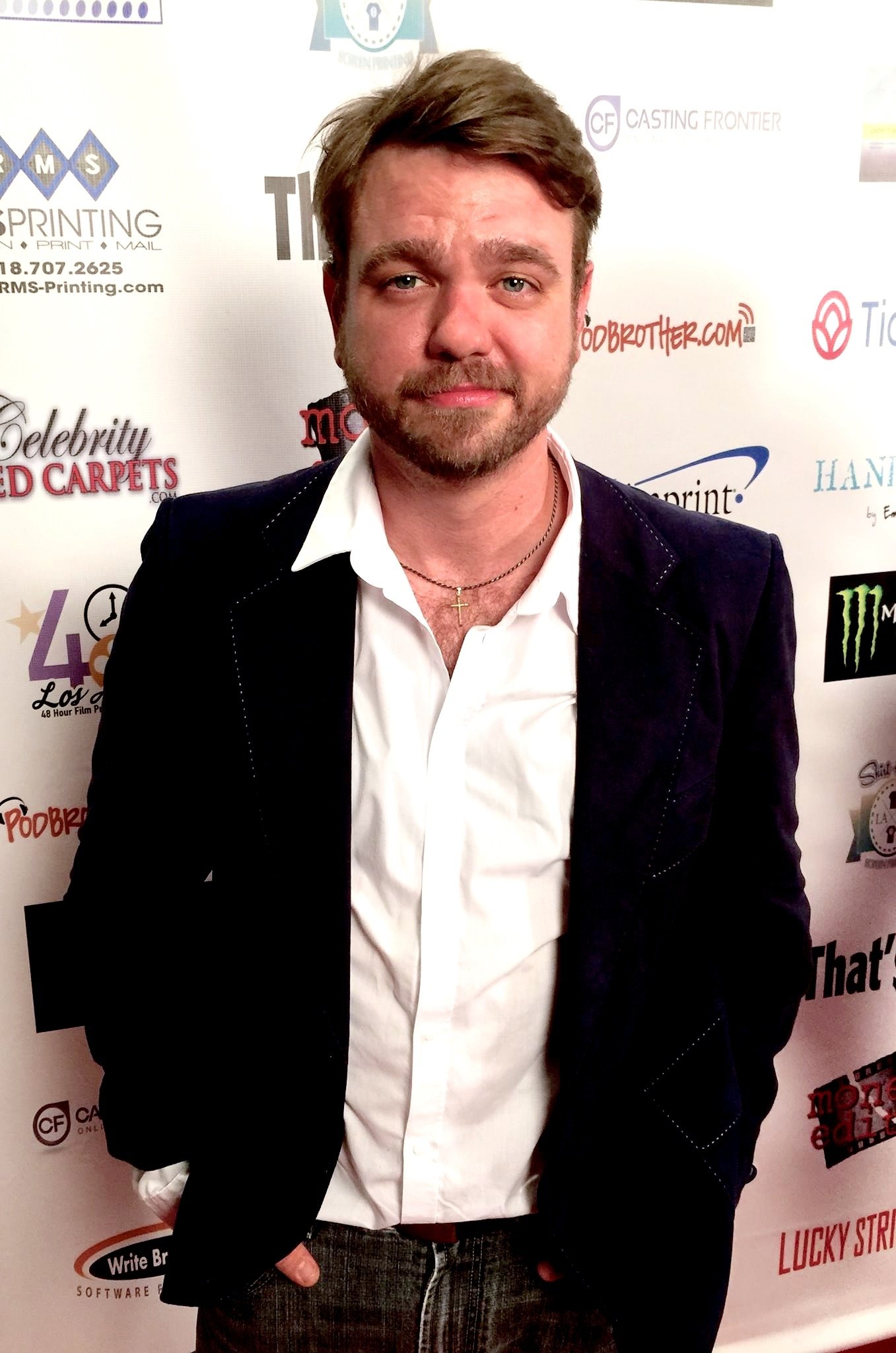 Actor Bryan McKinley on the red carpet at the premiere of 