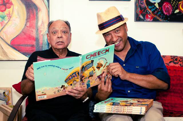 Cheech Marin and Juan Escobedo at his book signing.