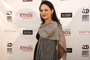 Stepping out in style, Elizabeth Regal aka Elizabeth Perez arrives at the Project Ethos 