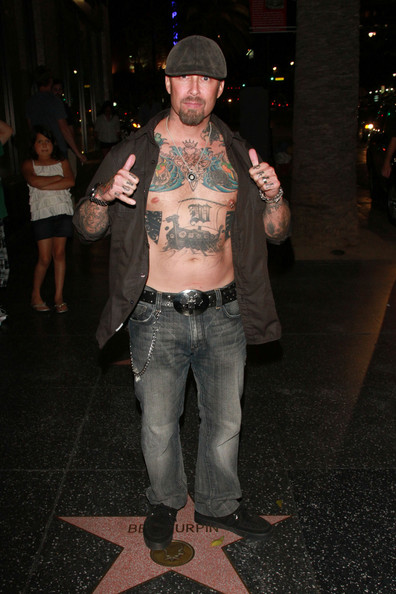 David Dossett bares his tattooed chest outside Katsuya in Hollywood.