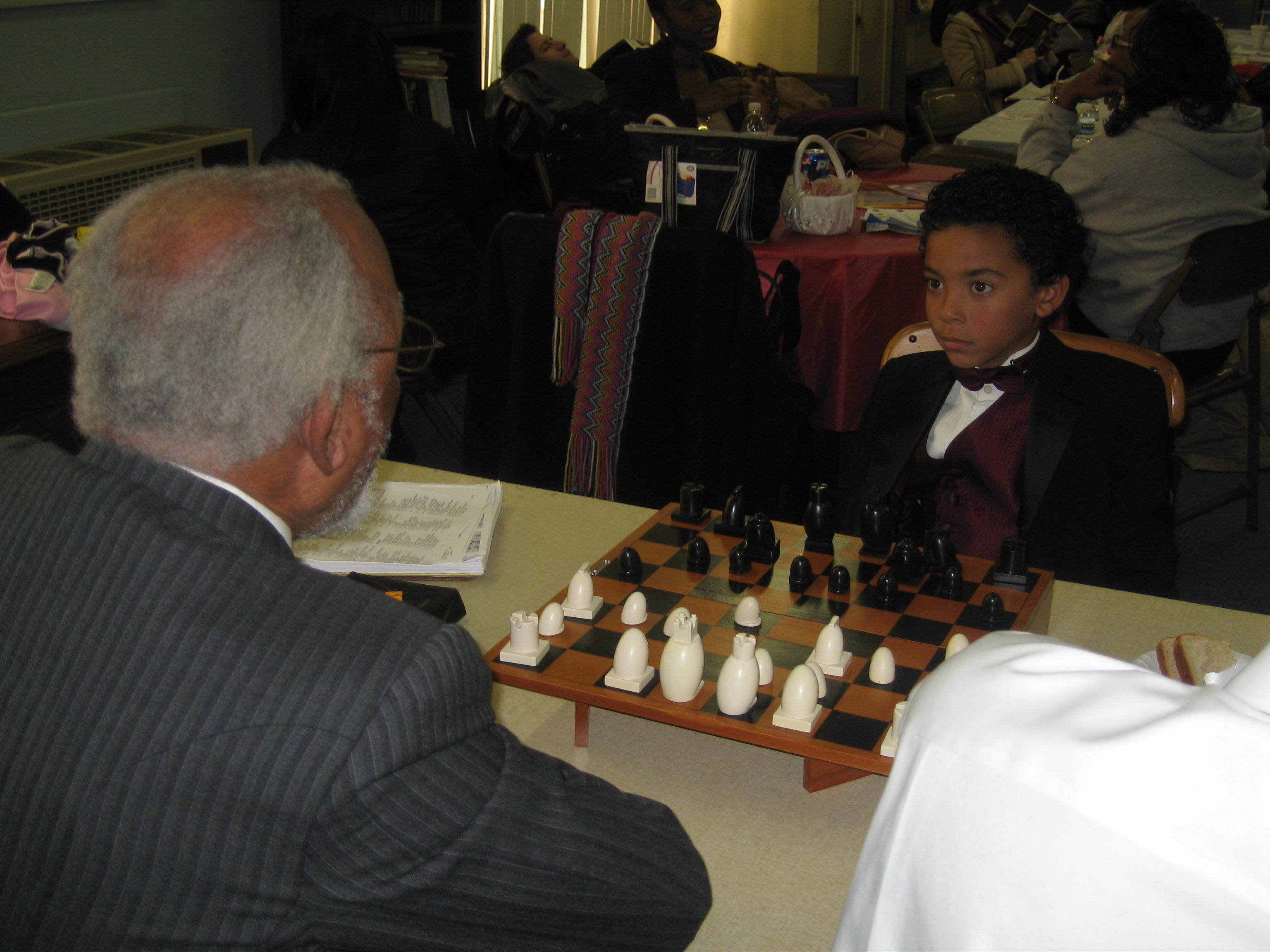 Ethan playing Chess on the set of 