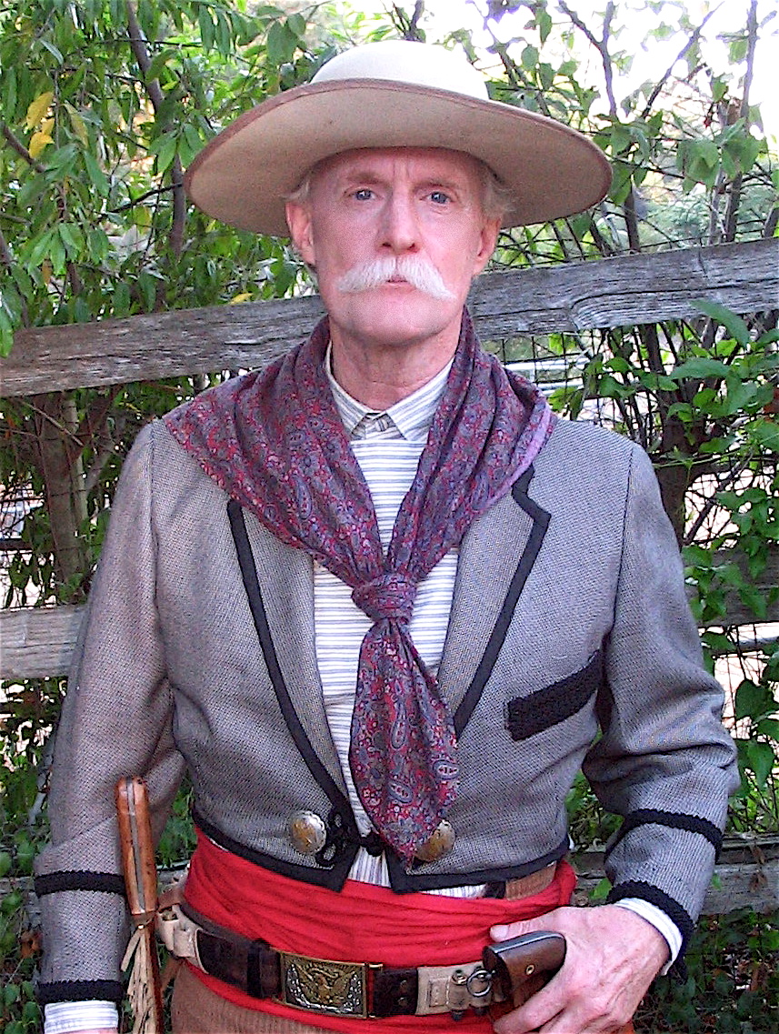 Cowboy, Wild West Tech, 2nd Season. Shirt, sash, trousers, bandana, looped belt were all made by John.