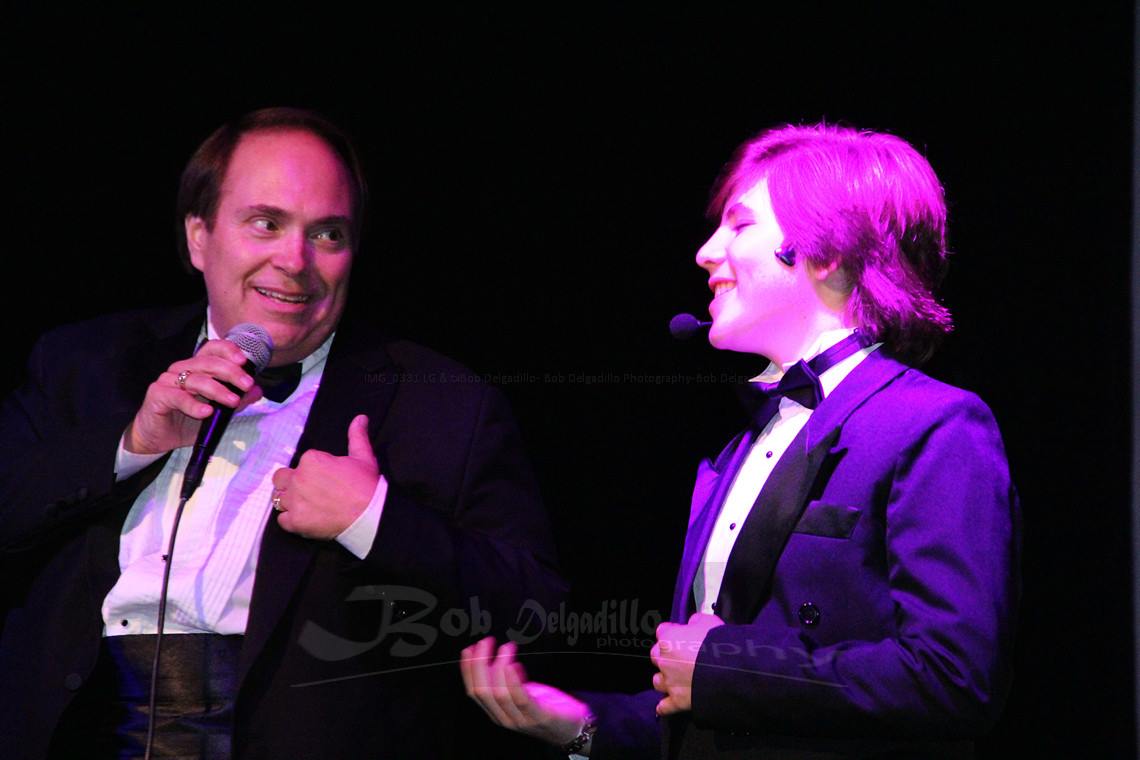 Donovan Dustin performing a duet with Jon Woodward at Hidden Valley the Awakening Official Book release at the Hayworth Theatre