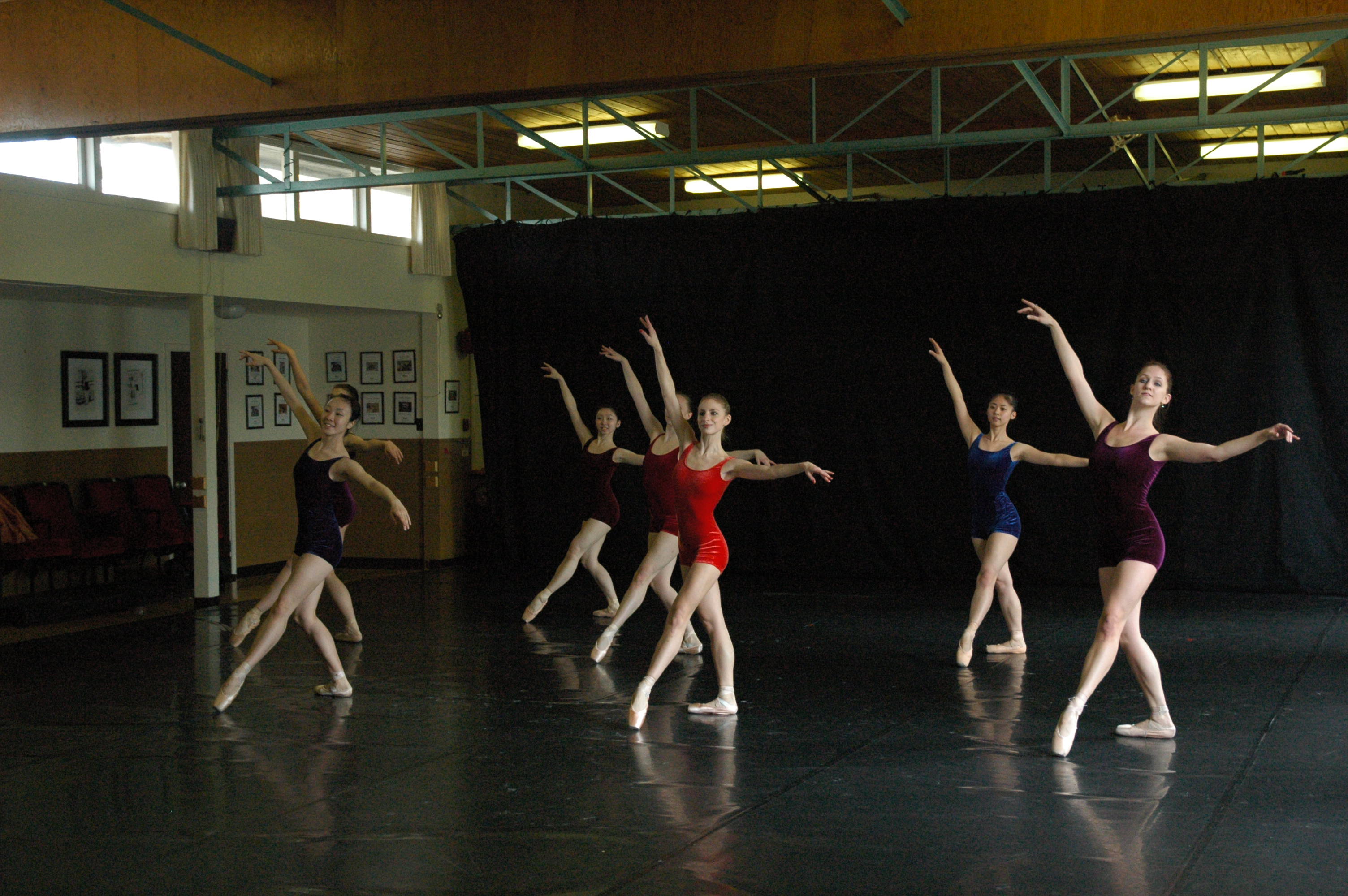 BALLET VICTORIA: Andre Bayne - prima ballerina (center front in red); Paul Destrooper - choreographer