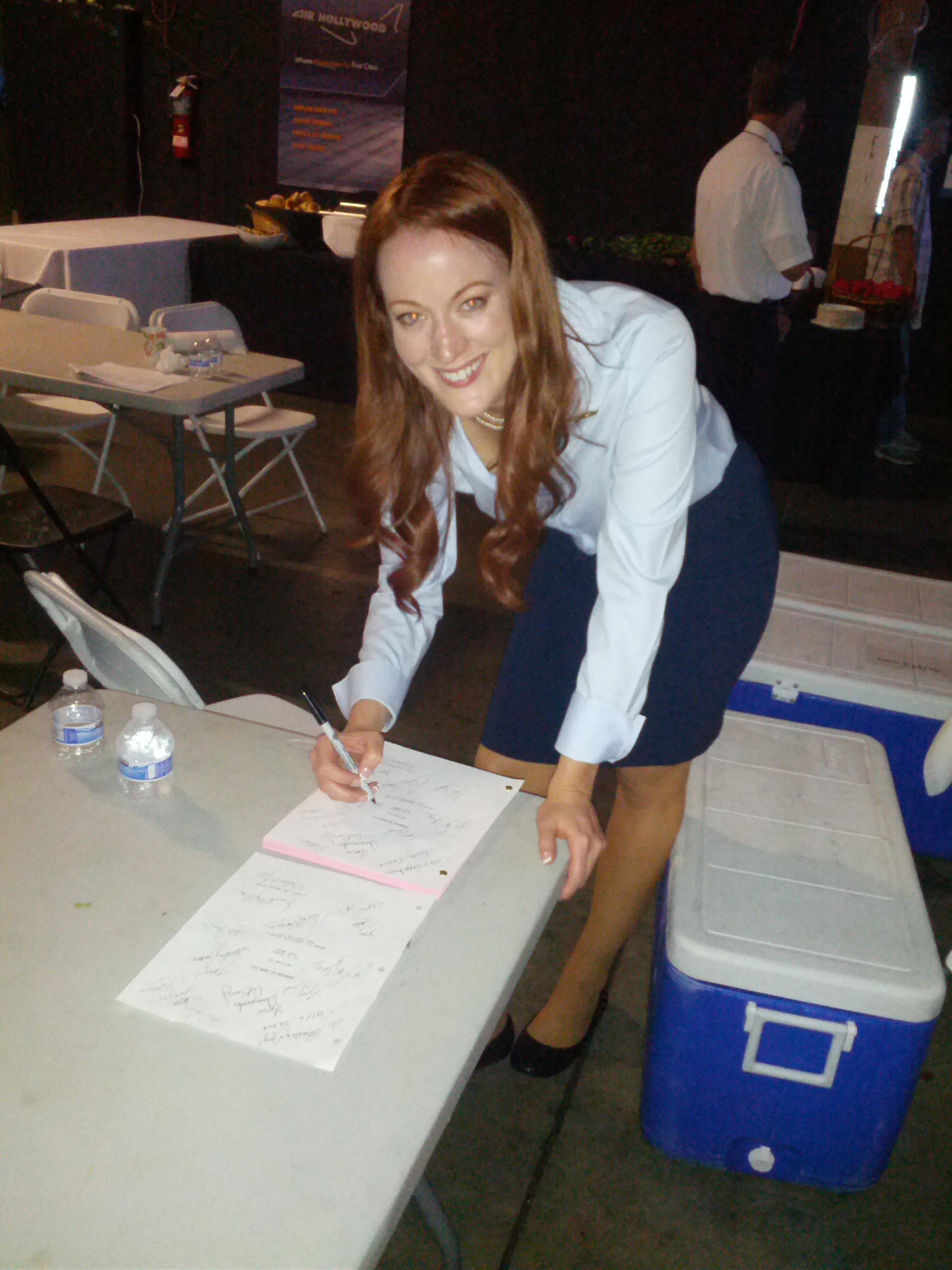 Signing script on set as Flight Attendant Kathy Jones on 