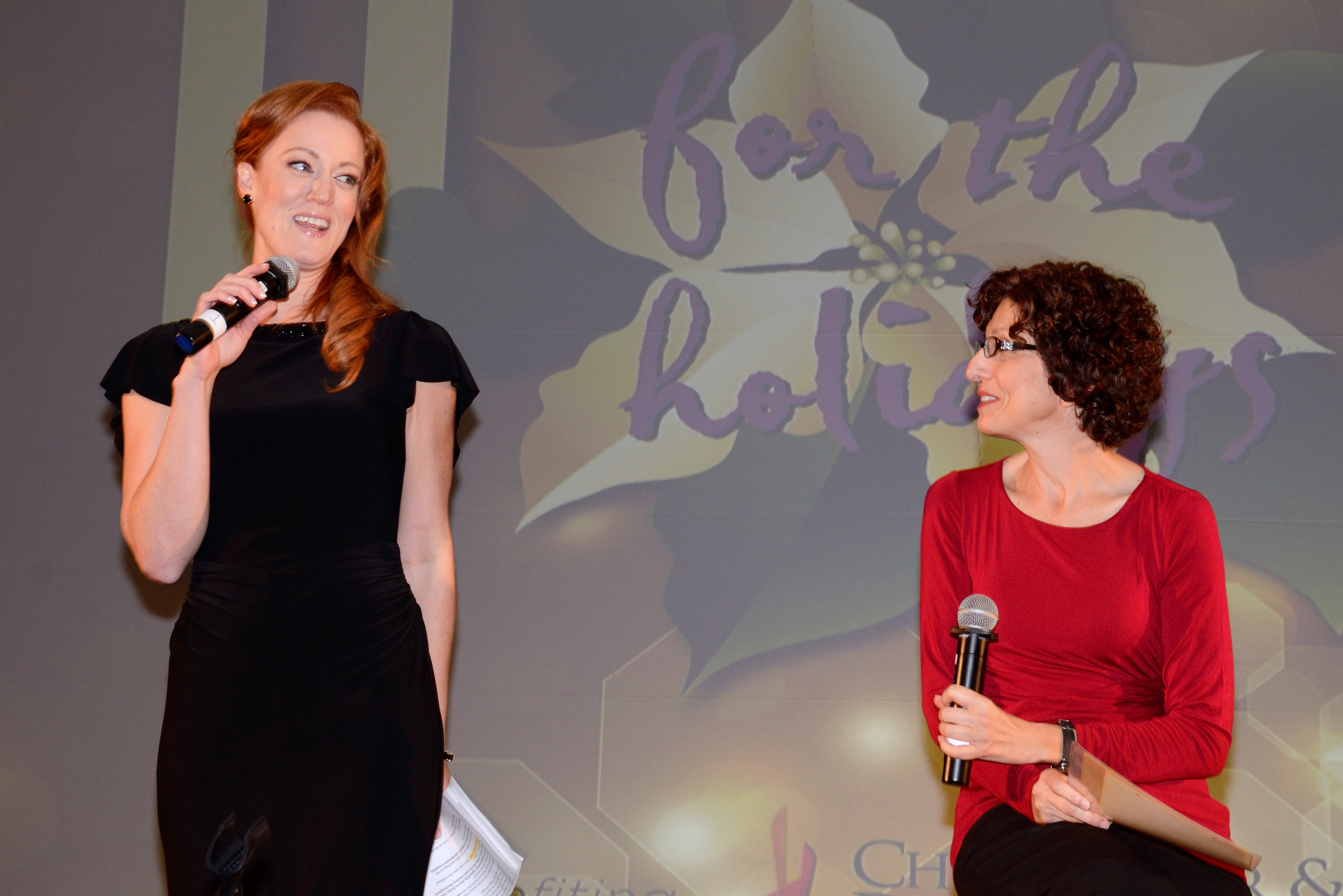 Adele René and stand up comedian Cathy Ladman on stage at the Christopher and Dana Reeve Foundation Gala Dec 7, 2014